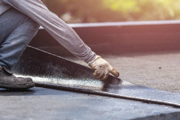 Professional Basement Waterproofing technician working in Lakeland, NY